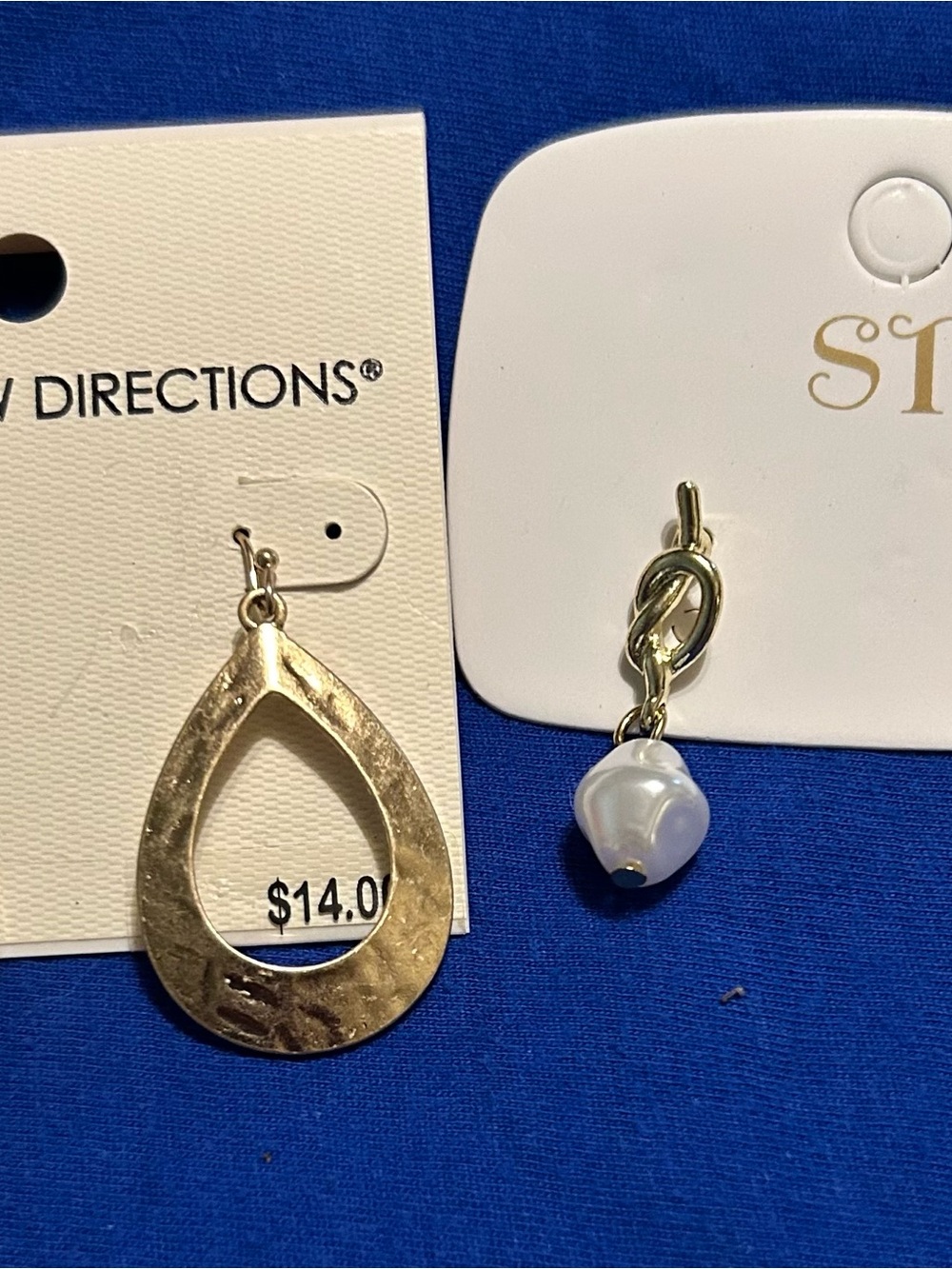 Earrings on display card